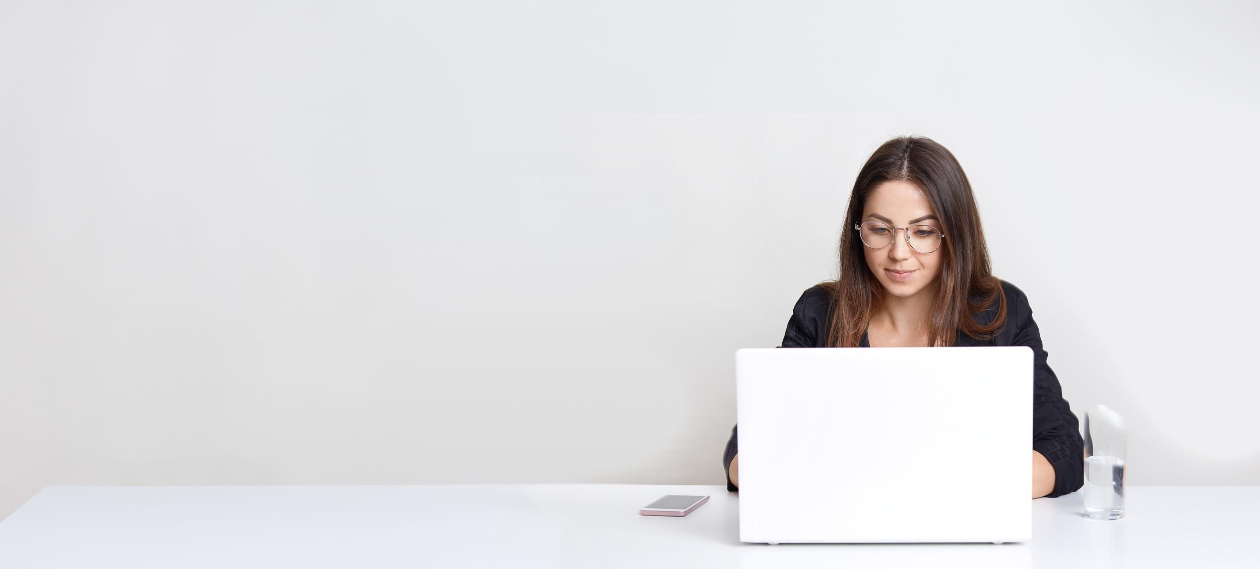 A young woman working on a latop
