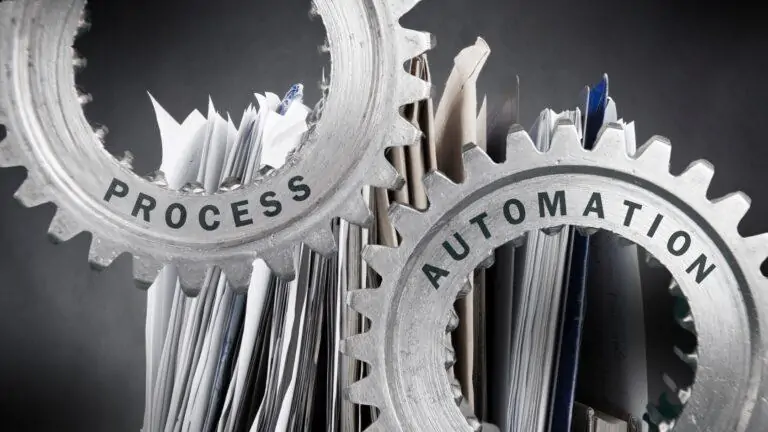 what is document automation? Image showing the concept of paper documents and automation on top